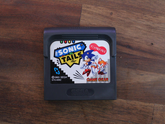 Sega Game Gear cartridge with Sonic the Hedgehog design on a wooden surface