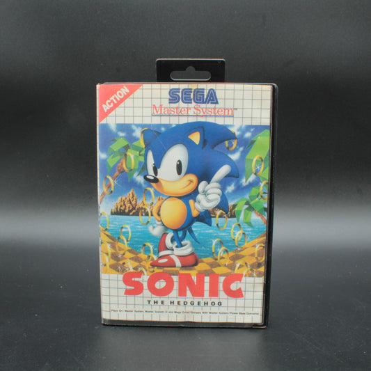 Sega Master System Sonic the Hedgehog game cartridge on a black background
