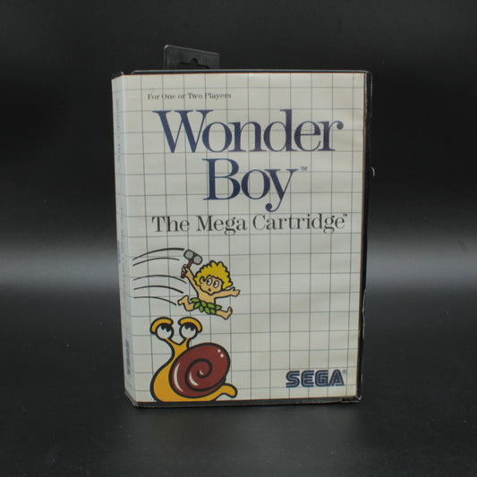 Vintage 'Wonder Boy' SEGA game cartridge packaging on a dark 
background Retro rare